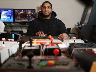 Norman Forrest, who is going to Toronto to compete in a national Street Fighter V competition, has a large collection of fight pads in his Saskatoon home on May 8, 2016.