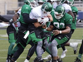 After some gruelling early-camp workouts — such as this 2016 session in which defenders try to take the ball from Saskatchewan Roughriders receiver Rob Bagg — Wednesday is welcomed by all the players.
