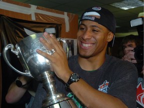 Matt Dominguez, shown celebrating the Saskatchewan Roughriders' 2007 Grey Cup victory, is a worthy inductee into the CFL team’s Plaza of Honor — as is long-time athletic therapist Ivan Gutfriend — in the opinion of columnist Rob Vanstone.