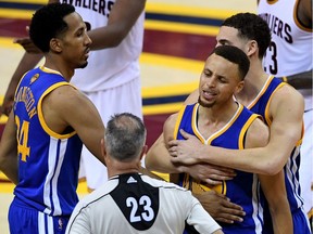 Stephen Curry of the Golden State Warriors reacts to a foul call during Game 6 of the NBA final Thursday. Curry's mouthguard paid the price for his frustration.