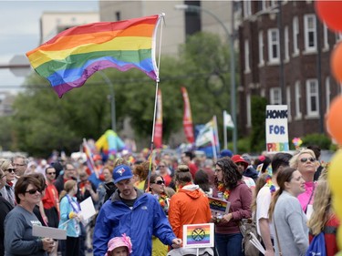 A pride flag flies over the Queen City Pride Parade in Regina, Sask. on Saturday June. 25, 2016.