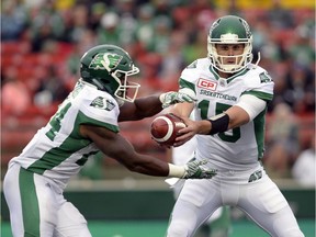 Saskatchewan Roughriders running back Terrance Cobb, left, shown accepting a handoff from B.J. Coleman, was among Murray's Monsters after Saturday's 28-16 CFL pre-season loss to the visiting B.C. Lions.