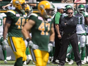 Saskatchewan Roughriders head coach Chris Jones, shown on the right during a June 18 pre-season game in Edmonton, should re-ignite the Roughriders' rivalry against the Eskimos.
