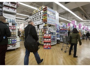 File photo of customers shopping  at a Bed Bath & Beyond in New York. Based on current trends, Saskatchewan is  heading to a second year in a row of declining retail sales.