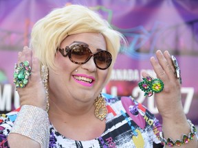 Gerrard Dillman, also known as Yada, shows off some accessories at the Queen City Pride booth at the Farmers' Market in Regina, Sask. on Saturday June. 18, 2016. MICHAEL BELL