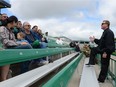 Saskatchewan Roughriders head coach Chris Jones speaks to the fans at Sunday's practice, when the attendees were asked to refrain from posting information on social media.