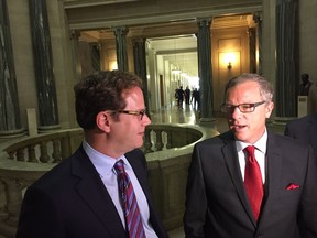 Crescent Point president and CEO Scott Saxberg and Premier Brad Wall talk to reporters at the Legislative Building Thursday