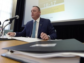 Finance Minister Kevin Doherty speaks to media during a morning technical briefing of the provincial budget at the Legislative Building on Wednesday.