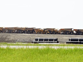 Heavy duty road construction equipment sits idle atop some of the already completed Regina bypass construction in early June 2016.