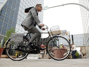 Lawyer James Korpan rides his bicycle to work in downtown Regina on June 07, 2012.