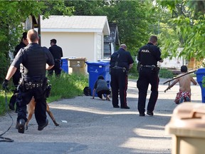 REGINA SK: JUNE 08, 2016 – Regina city police in the east alley of the 1500 block of Garnet Street after a shooting sent a male to hospital. DON HEALY / Regina Leader-Post