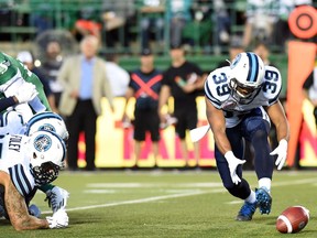 The Toronto Argonauts' Matt Black retrieves a Saskatchewan Roughriders fumble en route to scoring from 27 yards away during first-half CFL action Thursday at Mosaic Stadium. Toronto won 30-17.