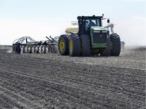 REGINA,Sk: April 28, 2016 -- Faron and Patricia Jones work seeding barley in one of their fields near Edgeley Saskatchewan Thursday afternoon. BRYAN SCHLOSSER