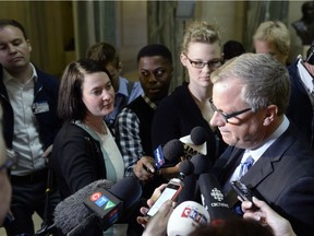 Premier Brad Wall speaks to reporters at the Saskatchewan Legislature on April 5, the morning after he led the Saskatchewan Party to its third term governing the province.