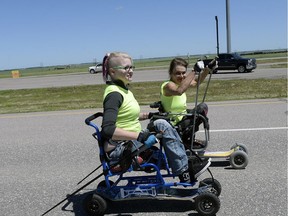 Krystle Shewchuk (left) and Colette Bourgonje (shown) and para-athletes travelling from Craven to Regina, today. The tour originated in Prince-Albert, and concludes in Regina. It passed through 10 communities along highway #11. Para-athletes and volunteers stopped in communities to offer information about para-sports with the goal to create awareness and recruit youth.