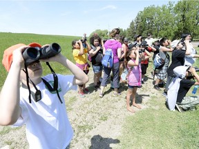 Children from Sacred Heart Community School were at the Wascana Centre habitat conservation area to meet Councillor Mike O'Donnell and get a guided tour from ecologist Sarah Turkeli.
