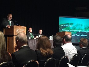 Saskatchewan Roughriders chair Wayne Morsky, left, addresses the crowd at the Saskatchewan Roughriders' annual general meeting on Wednesday at the Conexus Arts Centre.