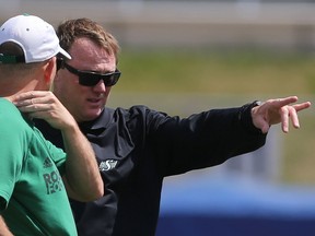 Saskatchewan Roughriders head coach and general manager Chris Jones, shown at the right at during Sunday's practice, was not pleased with his team's performance in Saturday's controlled scrimmage.