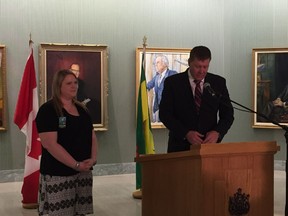 Scott Moe, minister for advanced education in Saskatchewan, speaks at an announcement at the Saskatchewan Legislative Building regarding the recently implemented Graduate Retention Program First Home Plan. Regina resident, Kaleigh Maguire, stands next to him. Maguire took advantage of the program, receiving a tax-free loan for the down payment on a house. She moved into her new home on Tuesday. Photo/Ashley Robinson