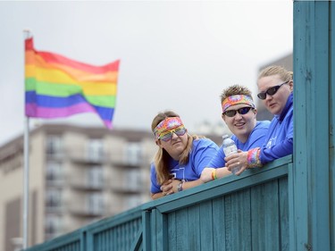 Shannon Czemeres, Kara Haus, and Dru Black at the Queen City Pride Parade in Regina, Sask. on Saturday June. 25, 2016.