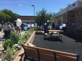The new patio for residents at Extendicare/Parkside opened officially on Thursday. The patio was a community project done by the Sasktel Pioneers.
