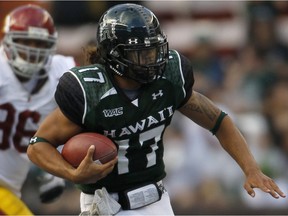 Bryant Moniz, whose signing with the Saskatchewan Roughriders was announced on Saturday, is shown with the University of Hawaii in 2010.