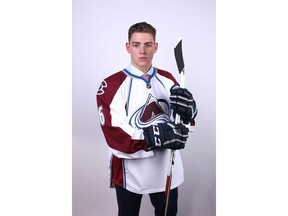 Tyson Jost poses for a portrait after being selected 10th overall by the Colorado Avalanche in the 2016 NHL Draft on June 24 in Buffalo.