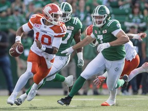 Justin Capicciotti, left, shown pursuing B.C. Lions quarterback Jonathon Jennings during a July 16 game, had his first two sacks as a Saskatchewan Roughrider on Friday.