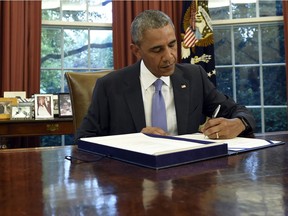 President Barack Obama at work in the Oval Office of the White House in Washington last month.