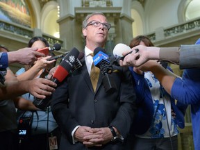 Brad Wall speaks to media at the Legislative Building about the Husky oil spill on Wednesday July 27, 2016.