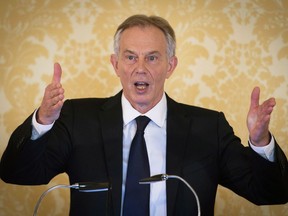 Former British prime minister Tony Blair expresses "more sorrow, regret and apology than you may ever know" in London on July 6 as he responds to a report on the 2003 Iraq war.
