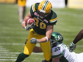Edmonton Eskimos slotback Chris Getzlaf was to play against his former team, the Saskatchewan Roughriders, for the first time in regular-season action Friday in Edmonton. Getzlaf is shown facing the Roughriders during pre-season action.