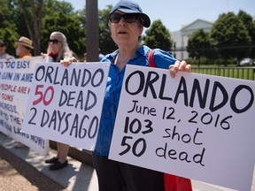 Americans protest against gun violence and call for tighter gun laws outside the White House in Washington.