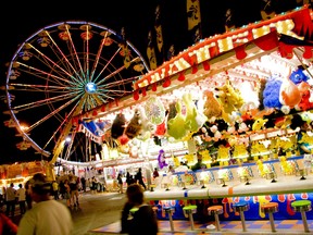 Barry Tappin says the Queen City Ex takes on an extra special glow at night with the midway lit up.