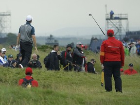 The bloom was off the Rose during Friday's action at the Open Championship at Royal Troon Golf Club. The conditions affected England's Justin Rose enough that he threw his club on this hole en route to a second-round 77. Even so, Rose made the cut.