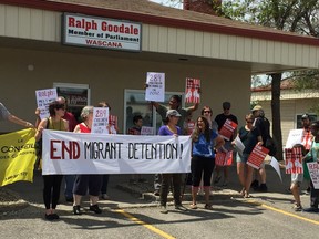 Protestors demonstrated outside Public Safety Minister Ralph Goodale's Regina office Thursday over the plight of immigrant detainees.
