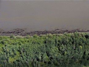 Oil is seen on the North Saskatchewan river near Maidstone on July 22 following the leak of between 200,000 and 250,000 litres of crude oil from a nearby Husky Energy pipeline.