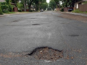 Potholes have long been an issue in Whitmore Park. An example on Chisholm Road in 2012.