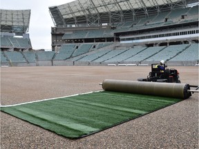 FieldTurf artificial turf being installed at Regina's New Mosaic Stadium.