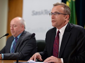 Jim Reiter right, minister responsible for SaskTel, and Ron Styles, SaskTel president and CEO, speak about the 2015/16 financial results on Wednesday.