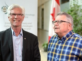 Federal Minister of Natural Resources Jim Carr, left and Ralph Goodale, Minister of Public Safety and Emergency Preparedness, talk about carbon capture technology.