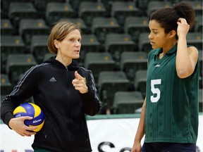 University of Regina Cougars head coach Melanie Sanford (shown at left in this file photo) has handed over the women's volleyball team to Shane Smith, who was named the team's interim head coach Wednesday. Sanford is taking the 2015-16 season off to fulfil other duties at the U of R.