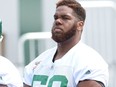 Offensive lineman Josiah St. John, the first overall pick in the 2106 CFL draft, practised with the Saskatchewan Roughriders for the first time on Monday after a month-long holdout.