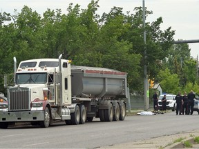 City police at the scene of a fatal bicycle and semi collision at Lewvan Drive and 4th Avenue in Regina.