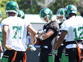 Mitchell Gale checks his play list during a recent Roughriders practice.