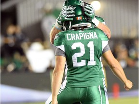 Saskatchewan Roughriders kicker Tyler Crapigna, 21, celebrates Friday's game-winning, 53-yard field goal with holder Rob Bagg at Mosaic Stadium. The Roughriders posted their first victory of the season Friday, defeating the previously unbeaten Ottawa Redblacks 30-29.