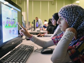 Zainab Barkat from Syria in computer lab at the University of Regina as part of summer camp for Arabic speaking children of refugee families. The camp is free and is hosted every Saturday by social work students. The camp includes volunteers, parents and translators. Social work students plan games, activities and outings in order to introduce the children to Canadian culture and Regina. DON HEALY / Regina Leader-Post