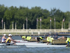 Rowers line up at the starting docks at the Canadian masters rowing championships on Wascana Lake on Sunday.