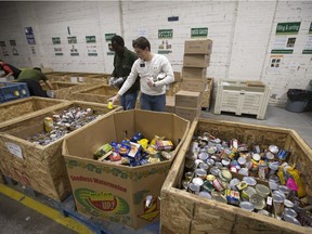 Volunteers sort containers at the Saskatoon Food Bank and Learning Centre, on Nov. 17, 2015.