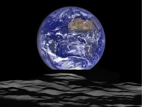 This NASA image released Dec. 18, 2015 shows a view of Earth from a spacecraft's vantage point in orbit around the moon.